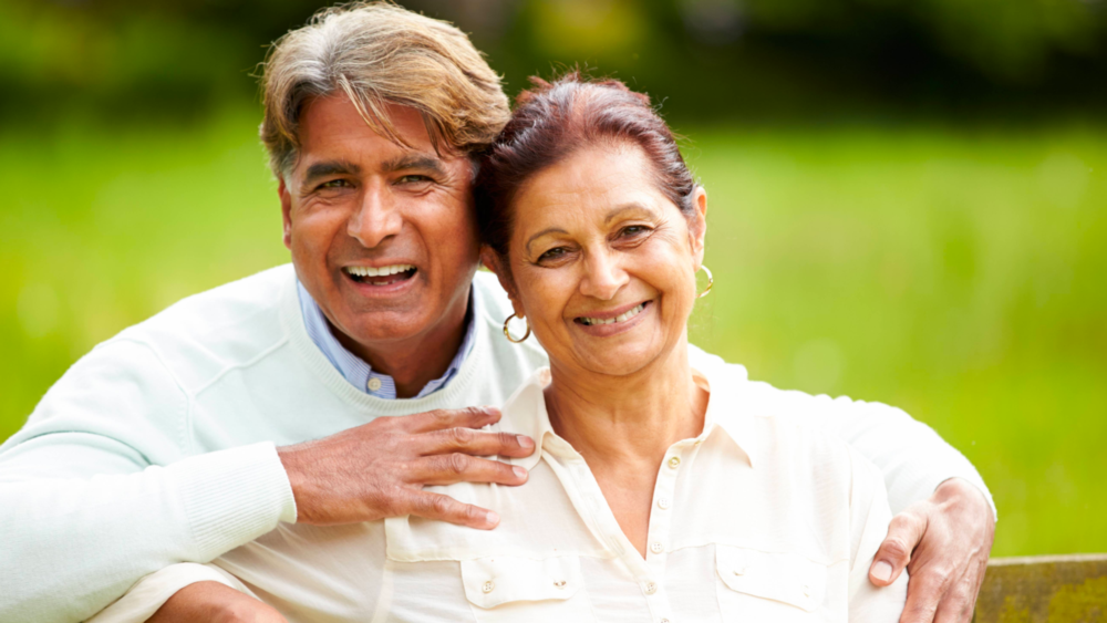 An older couple smiles | Complete and Partial Dentures in St. Paul MN